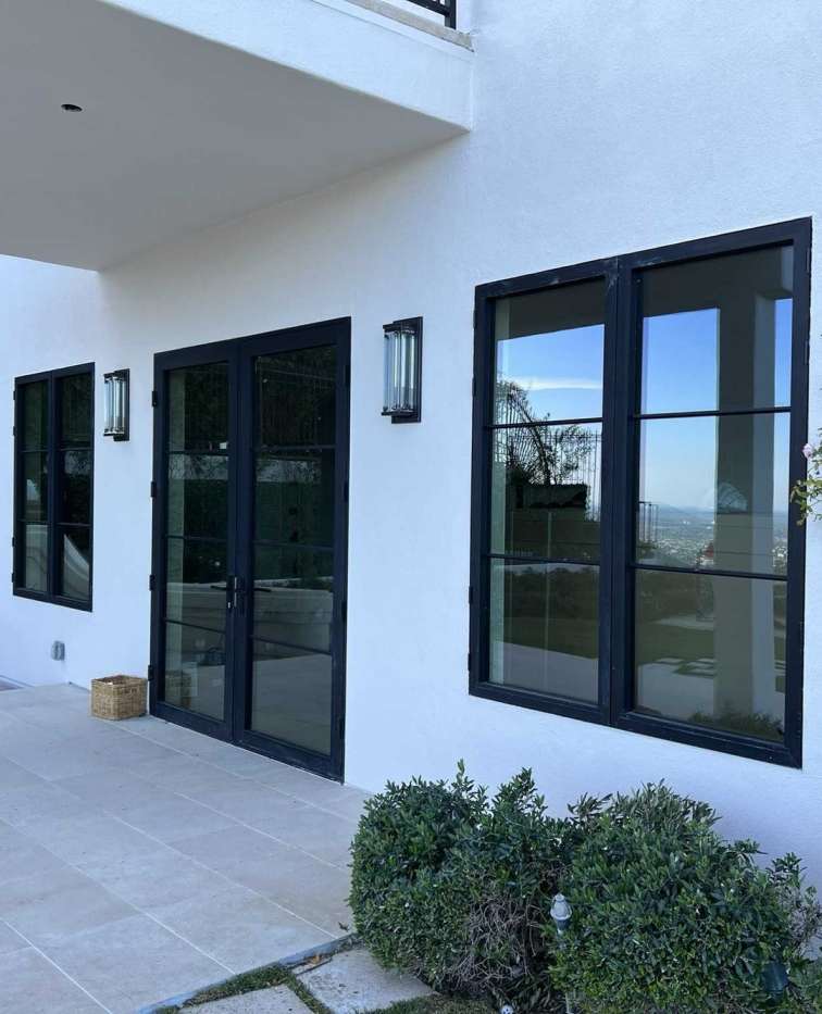 Window and door contractor in Encino installing modern windows and entry door