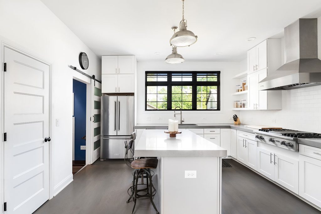 Luxury kitchen remodel in Sherman Oaks with custom cabinets and high-end island by T&N Remodeling Inc
