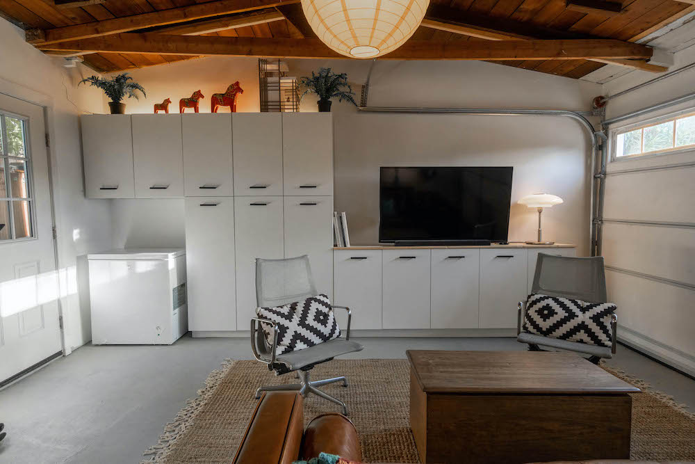 Modern garage conversion in Encino transformed into a functional living space by T&N Remodeling Inc.